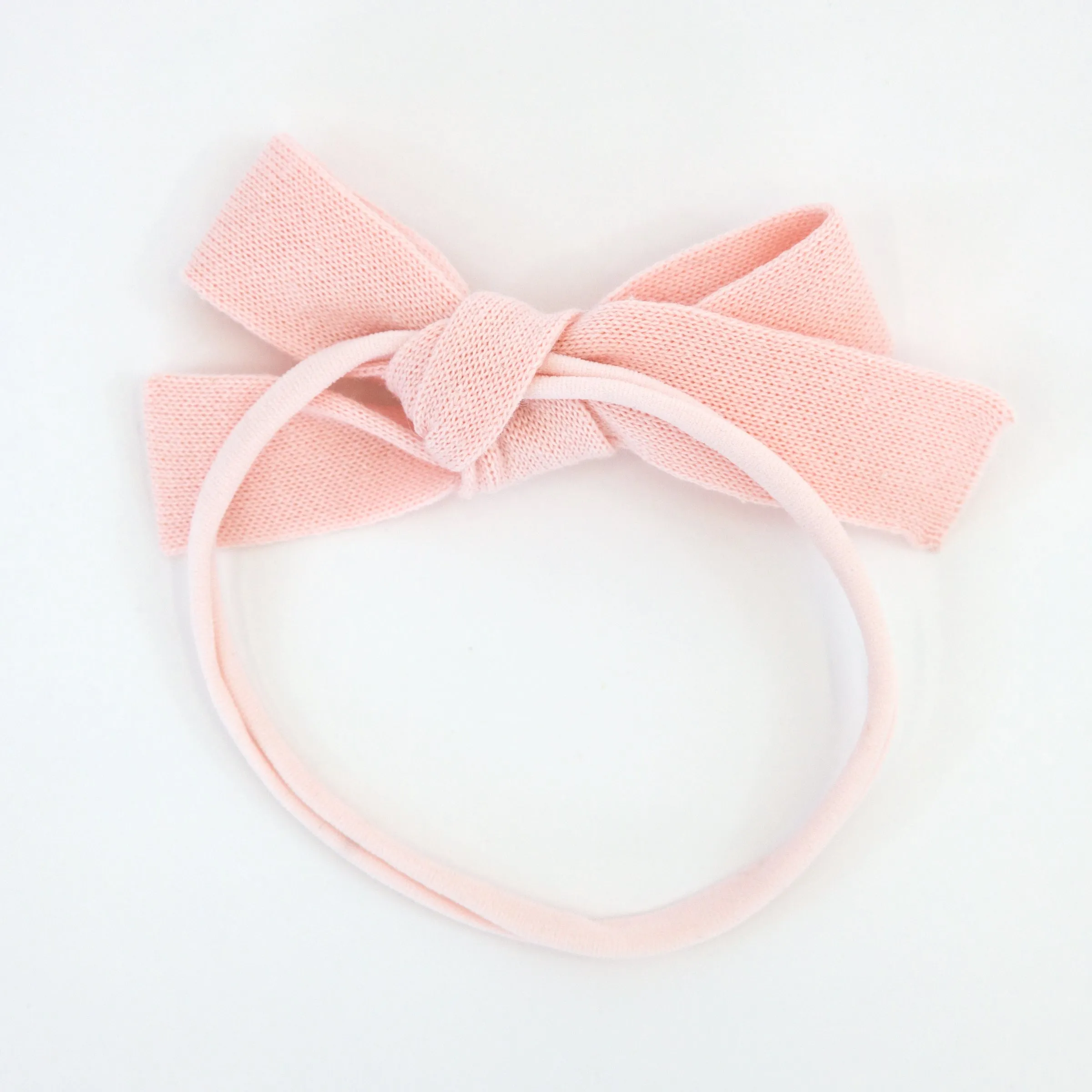 oh baby! Knitted Bow on Nylon Headband - Pale Pink